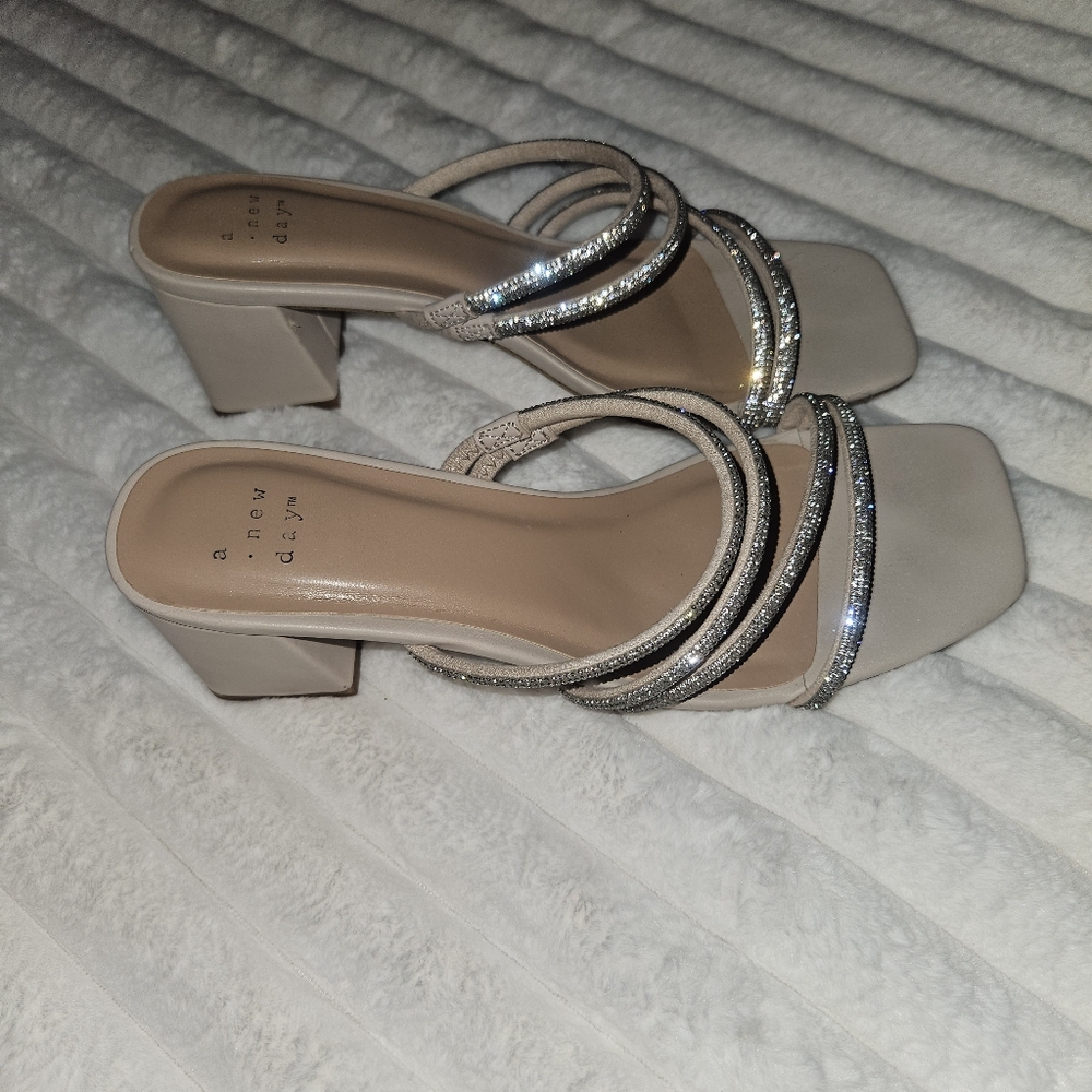 A New Day Cream and Silver Heels with Elegant Design